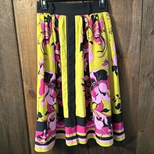 Eva Mendes yellow, pink, and black floral print skirt